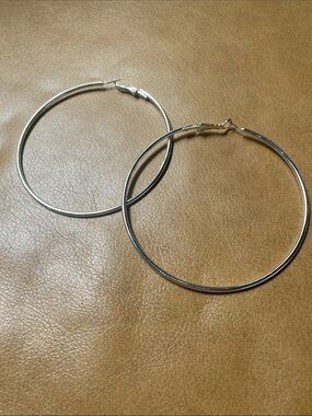 Large 2.75” diameter silver tone hoops